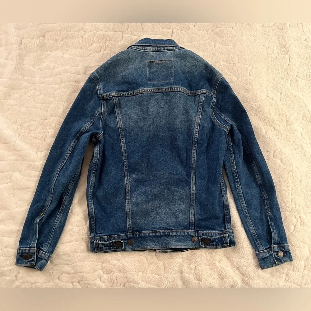 Levi's Trucker Jacket in a dark wash blue denim size S